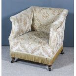 A Late Victorian Square Tub Shaped Easy Chair in the Manner of Howard & Sons, upholstered in cut