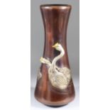 A Japanese Patinated Bronze And Silver Vase, Meiji Period, cast with three Chinese geese,