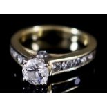 A Diamond Solitaire Ring, Modern, by Tolkowsky, in 18ct gold mount, the centre set with a round