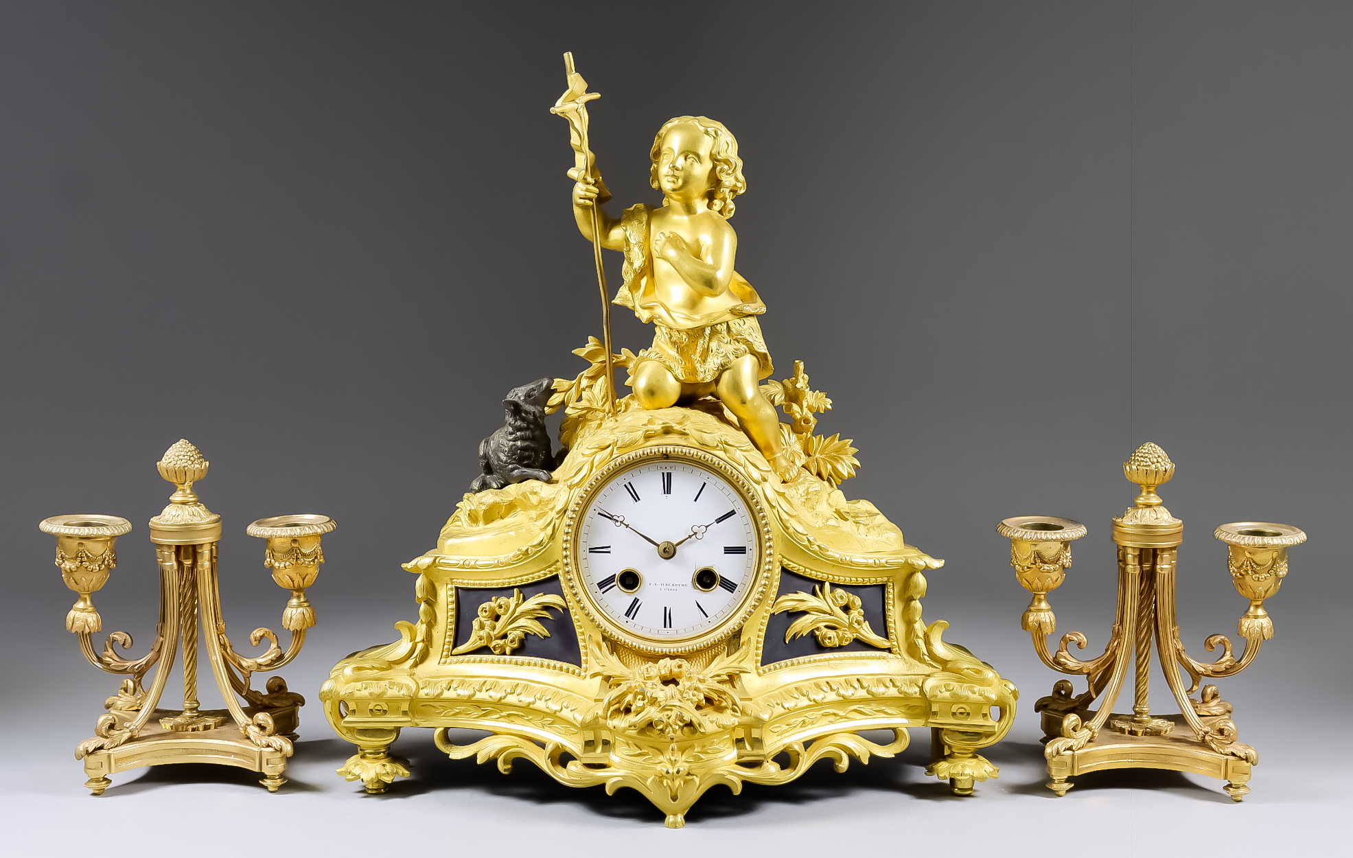 A 19th Century French Gilt Brass and Bronzed Mantel Clock, by F. L. Hausburg of Paris, No. 5404