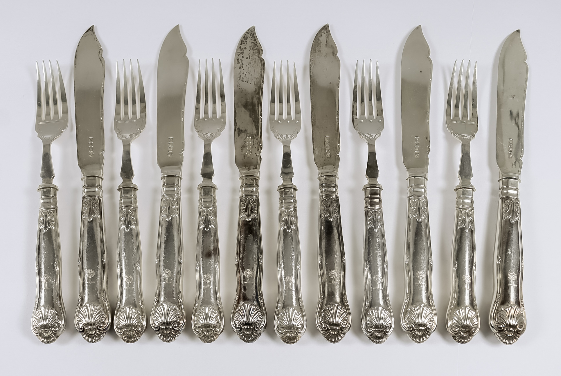 A Set of Six George V Silver Fish Knives and Forks, by Mappin & Webb, Sheffield 1914, the shaped