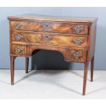 An 18th Century Continental Figured Mahogany Commode, the top inlaid with bandings and with