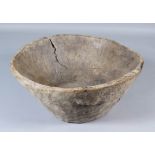 A Large Dug-Out Wooden Bowl, Possibly Welsh, 19th Century, with two carrying lugs, 20ins diameter
