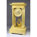 A 19th Century French Gilt Brass Cased "Empire" Style Mantel Clock, the 3.625ins diameter gilt