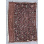 An Antique Turkmen Juval, woven in muted colours, the field filled with four rows of five