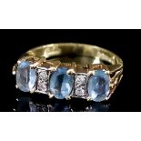 A Three Stone Aquamarine Ring, in 18ct gold mount, the three aquamarine, approximate total