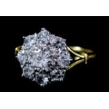 A Diamond Flower Head Pattern Ring, Modern, in 18ct yellow gold mount, set with round brilliant