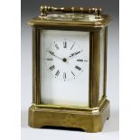 A Late 19th/Early 20th Century French Miniature Carriage Timepiece, the white enamel dial with Roman