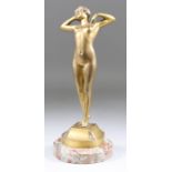 Louis Oury (1867-1940) - Gilt bronze - "Premier Frisson" - Young naked female stretching, signed and