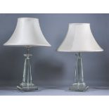 A Pair of Moulded and Polished Clear Glass Electric Table Lamps, of pyramidal form, on stepped
