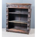 A Late 19th Century Continental "Black Oak" Open Front Dwarf Bookcase, with carved edge moulding,