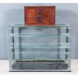 A Plate Glass Shop Counter Display Cabinet, with angled front, fitted three plate glass shelves,