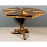 A 19th Century Anglo-Ceylonese Hardwood Hexagonal Table, the top inlaid with sunburst pattern,