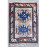 Two Turkish Rugs of Kazak Design, Modern, one woven in pastel colours with three bold geometric