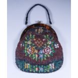 A Tortoiseshell Mounted Beadwork Evening Purse, worked with a floral design