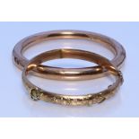 Two 9ct Gold Stiff Bangles, 20th Century, one fixed, the other in the form of a belt with clasp
