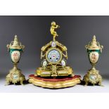 A Late 19th Century French Gilt Metal and Porcelain Mounted Mantel Clock and a Pair of Similar Urn