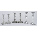 Three Pairs of Edward VII Silver Pillar Candlesticks, one pair by Hawksworth Eyre & Co. Ltd,