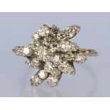 A Diamond Cluster Ring, Modern, in a platinum mount, set with round brilliant cut diamonds,