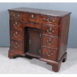 An Early George III Lady's Mahogany Kneehole Dressing Table, the top crossbanded and with narrow