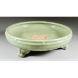 A Chinese Longquan Celadon Censer, Late Ming, with moulded rim, on three mask pattern stump feet,