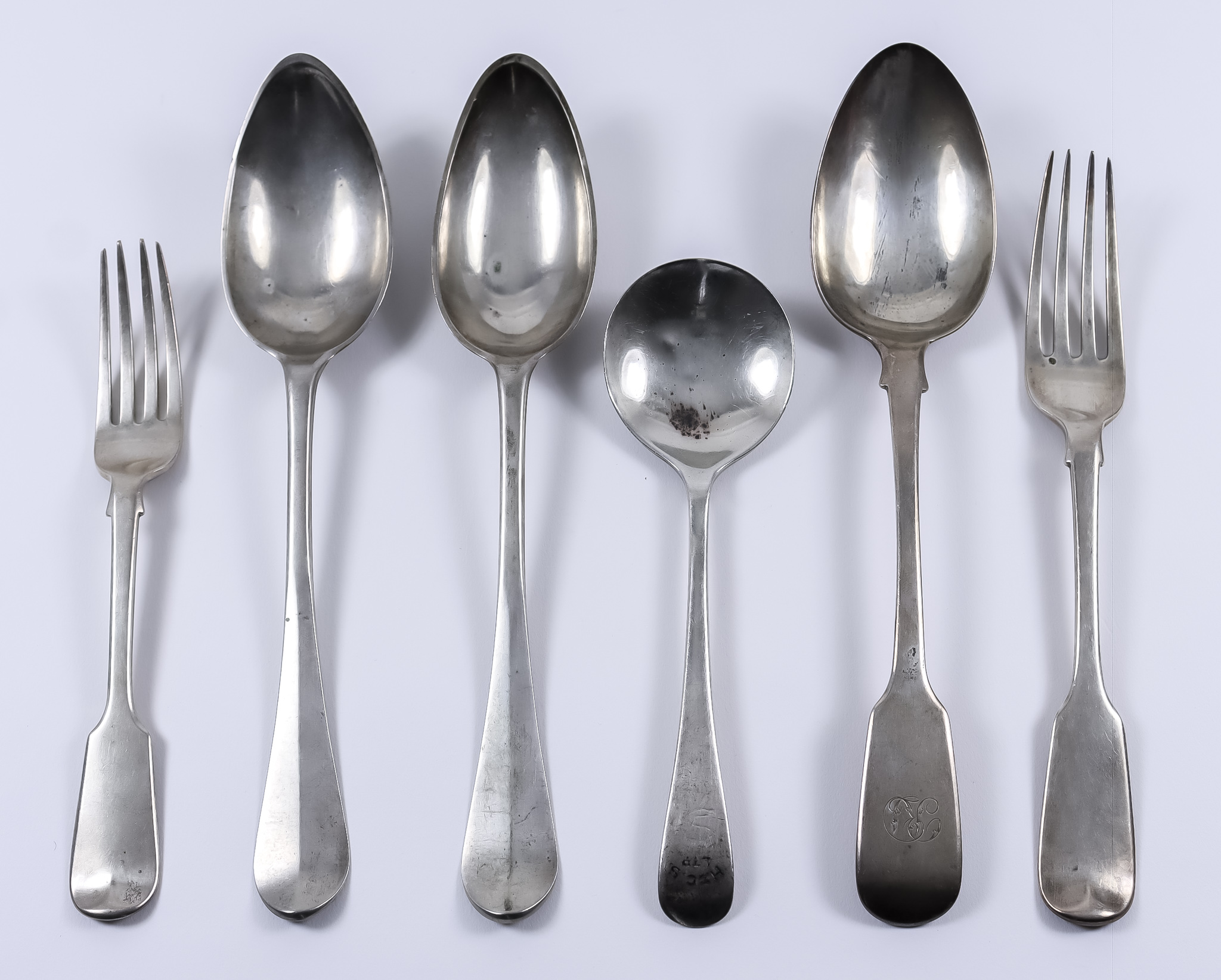 A William IV Silver Fiddle Pattern Table Spoon and Fork, and mixed silverware, the spoon and fork by