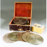 A Small Paper Covered Pine Cased Polyphon, Late 19th Century, to take 4.5ins diameter discs, with