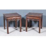 A Pair of Chinese Rosewood Square Lamp Tables, with flush panelled tops, fretted and carved aprons