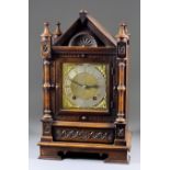 A Late 19th Century German Walnut Cased Mantel Clock, by Winterhalder & Hofmeier, the brass dial
