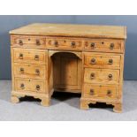 A Late Victorian Pitch Pine Rectangular Kneehole Desk, the top and drawer fronts inlaid with