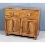A George III Mahogany Enclosed Wash Stand, the lifting top crossbanded in rosewood, enclosing rising
