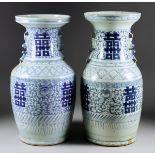 A Near Pair of Chinese Blue and White Porcelain Vases, Modern, the necks with moulded shishi, the