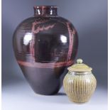 Tony Dasent (20th Century) - A South Heighton pottery vase, decorated in brown shades with copper