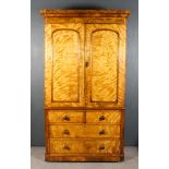 A Victorian Satin Walnut Wardrobe, with rounded front corners, the upper part with moulded