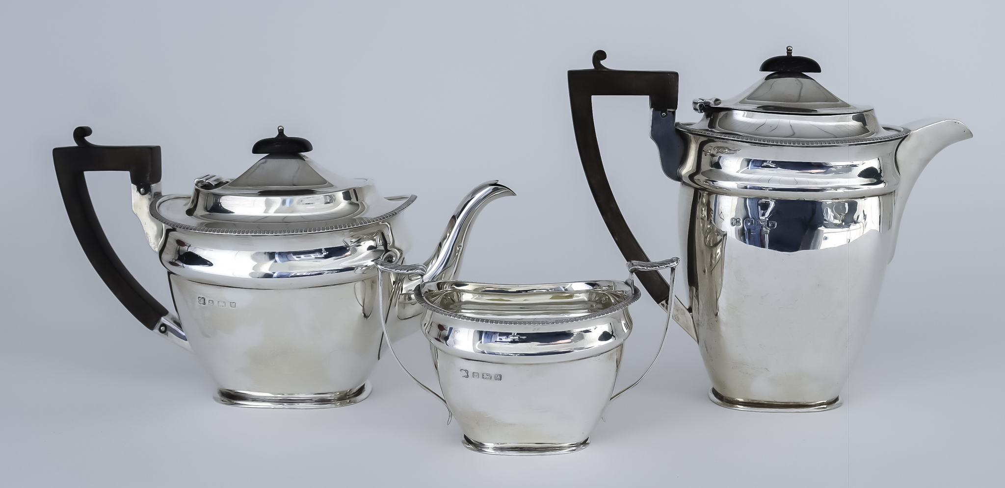 A George VI Silver Rectangular Three-Piece Part Tea Service, by Martin, Hall & Co, Birmingham