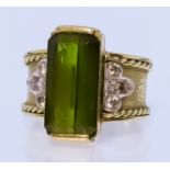 A Tourmaline and Diamond Ring, Modern, in 18ct gold mount, the centre tourmaline stone 25mm x