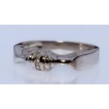 An 18ct White Gold and Diamond Ring, Modern, set with small brilliant cut white diamonds to