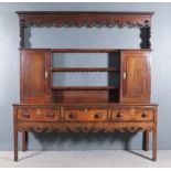 A Late 18th/Early 19th Century "North Country" Oak Dresser, the whole banded in mahogany, the