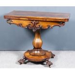 An Early Victorian Rosewood Rectangular Card Table, with rounded front corners, shaped apron