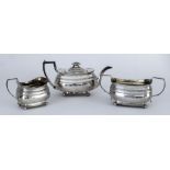 A George IV Harlequin Silver Rectangular Three-Piece Tea Service, by Alice & George Burrows II,