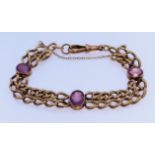 A 9ct Gold and Amethyst Double Row Bracelet, Modern, set with three faceted amethyst stones,