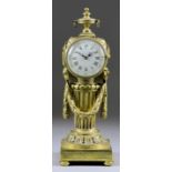 A Late 19th Century French Brass Cased Desk Timepiece, the 2.75ins diameter white enamel dial with