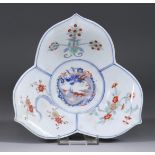 A Japanese Kakiemon Porcelain Tripartite Dish, 19th Century, enamelled in colours with a dragon to