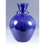 ***Trevor Corser (1938-2015) - Studio pottery vase, decorated in blue with two pierced lugs and