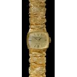 A Lady's Rolex Wristwatch, 20th Century, 9ct Gold Cased, with integral bracelet, the rectangular