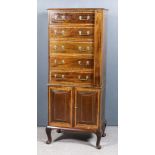 An Edwardian Mahogany Wellington Cabinet, the whole inlaid with satinwood bandings and boxwood