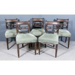 A Set of Fourteen George III Mahogany Dining Chairs, (including two armchairs with reeded arms and