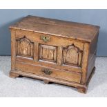 A Mid-18th Century Welsh Oak Coffer Bach, with plain lid, the front with central square fielded