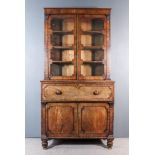 A William IV Mahogany Secretaire Bookcase, the upper part with narrow moulded cornice, fitted