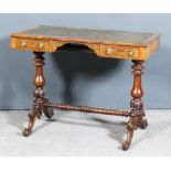 A Victorian Lady's Walnut Rectangular Writing Table, with green leather inset to top, fitted two